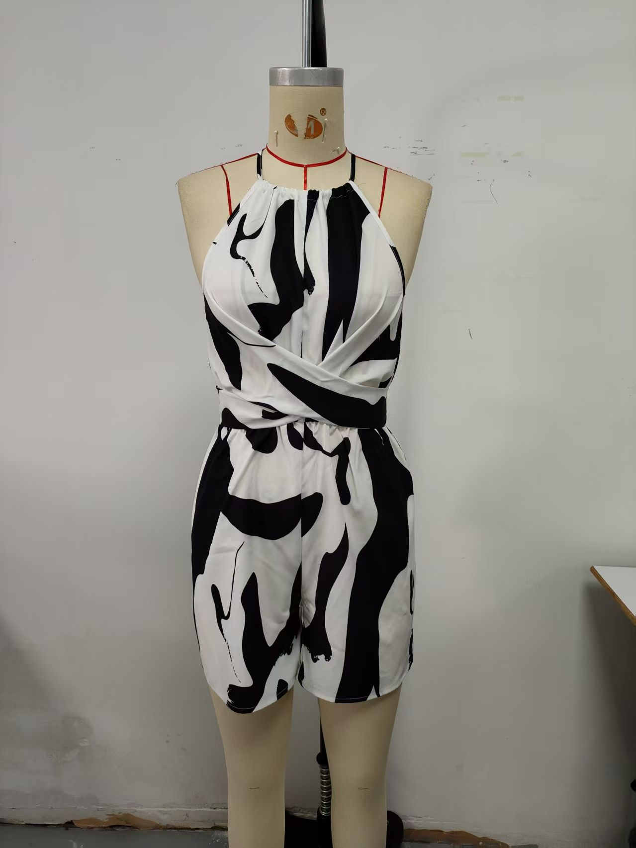 Zebra stripes, sleeveless jumpsuit with hanging neck