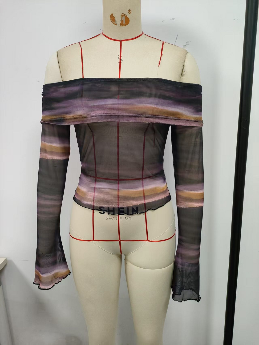 Black brown, long sleeved shirt with a flared collar and flared cuffs